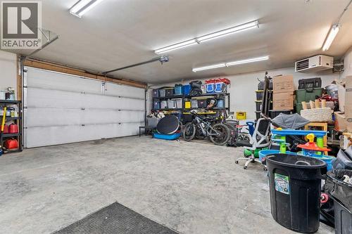 Heated garage - 311 Mcleod Crescent, Diamond Valley, AB - Indoor Photo Showing Garage