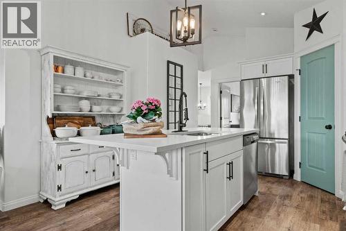 Generous pantry - 311 Mcleod Crescent, Diamond Valley, AB - Indoor Photo Showing Kitchen