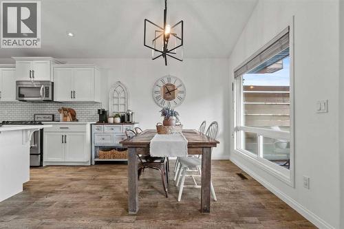 Dining room - 311 Mcleod Crescent, Diamond Valley, AB - Indoor