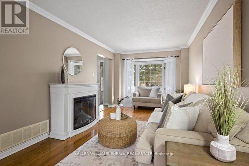 2 Resnik Drive, Clarington (Newcastle), ON - Indoor Photo Showing Living Room With Fireplace