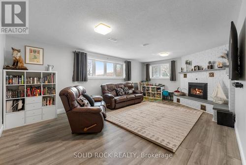 86 Township Park Road, North Algona Wilberforce, ON - Indoor Photo Showing Living Room With Fireplace
