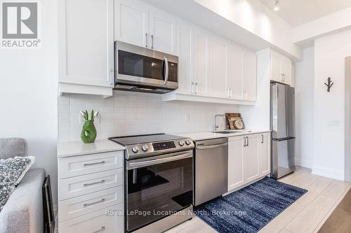 219 - 1 Hume Street, Collingwood, ON - Indoor Photo Showing Kitchen With Stainless Steel Kitchen
