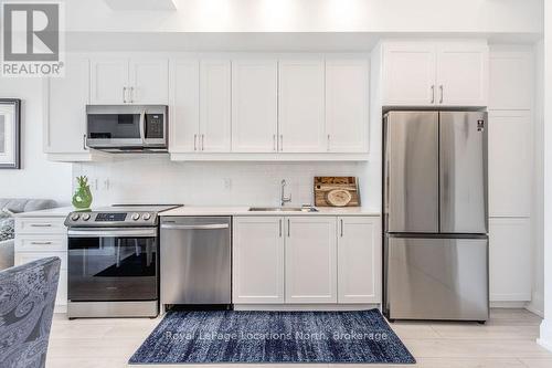 219 - 1 Hume Street, Collingwood, ON - Indoor Photo Showing Kitchen With Stainless Steel Kitchen