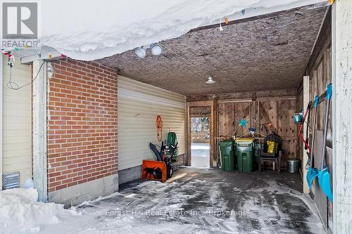 Carport with man-door to back yard - 58 Edith Avenue, Grey Highlands, ON -  With Exterior