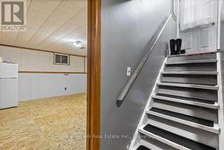 Stairs to basement at back door - 