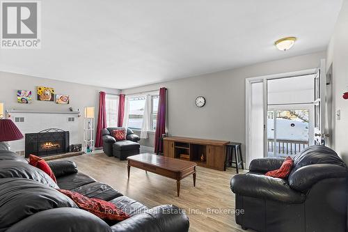 Lots of natural light in the Living Room - 58 Edith Avenue, Grey Highlands, ON - Indoor Photo Showing Living Room With Fireplace