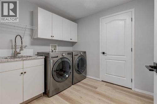 79 Discovery Ridge Park Sw, Calgary, AB - Indoor Photo Showing Laundry Room
