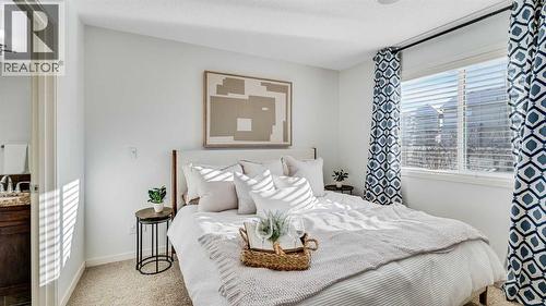 389 Cranberry Circle Se, Calgary, AB - Indoor Photo Showing Bedroom