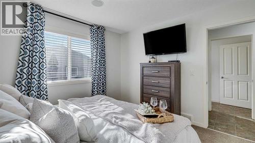 389 Cranberry Circle Se, Calgary, AB - Indoor Photo Showing Bedroom