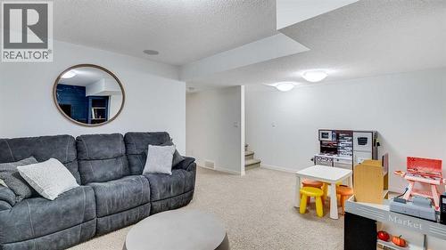 389 Cranberry Circle Se, Calgary, AB - Indoor Photo Showing Living Room