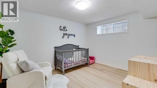 389 Cranberry Circle Se, Calgary, AB - Indoor Photo Showing Bedroom