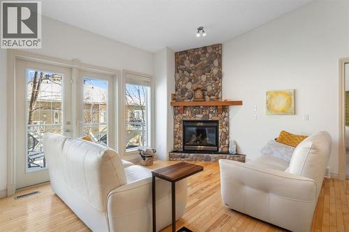 20 Ranch Road, Okotoks, AB - Indoor Photo Showing Living Room With Fireplace