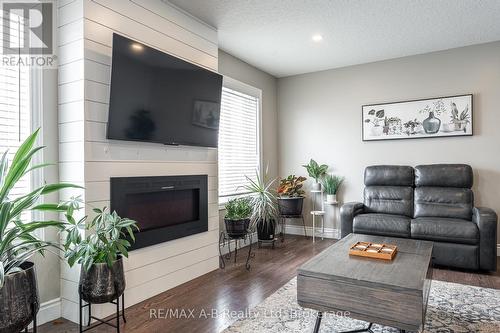 94 Wilson Court, St. Marys, ON - Indoor Photo Showing Living Room With Fireplace