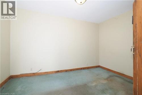 Carpeted spare room with baseboards - 37 Northumberland Street, Ayr, ON - Indoor Photo Showing Other Room
