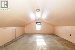 Bonus room with lofted ceiling and carpet flooring - 