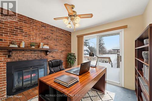 Den (previously a 3rd bedroom) (virtually staged) - 81 Clive Road, Kitchener, ON - Indoor With Fireplace