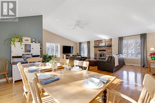 Open sightlines - 100 Nagle Way, Tay Valley, ON - Indoor Photo Showing Other Room With Fireplace