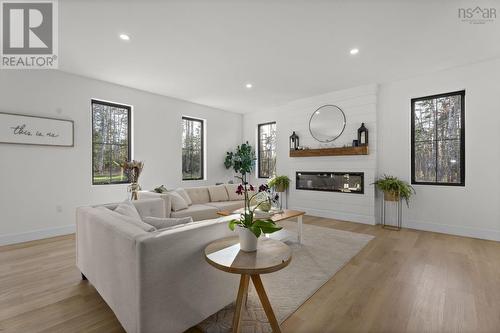 106 Edward Dr, Enfield, NS - Indoor Photo Showing Living Room With Fireplace