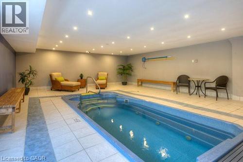 55 Green Valley Drive Unit# 1710, Kitchener, ON - Indoor Photo Showing Other Room With In Ground Pool