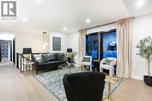 2416 Palliser Drive Sw, Calgary, AB - Indoor Photo Showing Living Room