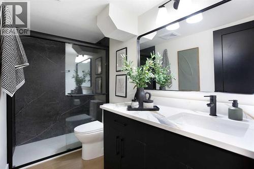 2416 Palliser Drive Sw, Calgary, AB - Indoor Photo Showing Bathroom