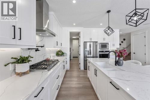 Lots of Storage - 27 Bridges Drive, Langdon, AB - Indoor Photo Showing Kitchen With Upgraded Kitchen