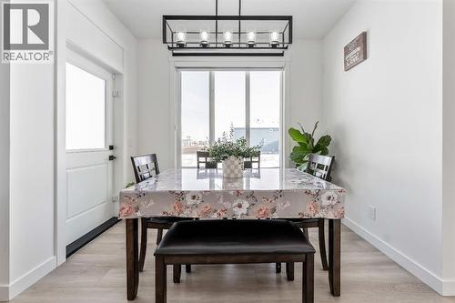 Dining - 27 Bridges Drive, Langdon, AB - Indoor Photo Showing Dining Room