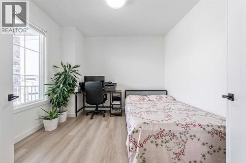 Front Office/ Den/ Flex Room - 27 Bridges Drive, Langdon, AB - Indoor Photo Showing Bedroom