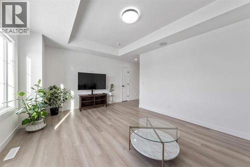 In-ceiling speakers - 27 Bridges Drive, Langdon, AB - Indoor Photo Showing Other Room