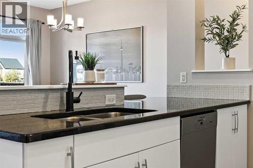 26 Chaparral Valley Common Se, Calgary, AB - Indoor Photo Showing Kitchen With Double Sink