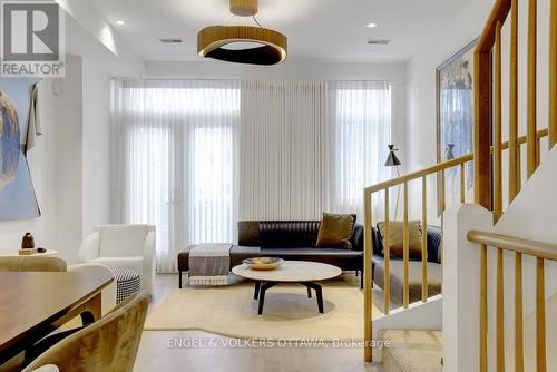 Brazilian walnut uplight/downlight ceiling fixture - 449 Edison Avenue, Ottawa, ON - Indoor