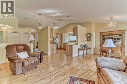 7 Scotia Landing Nw, Calgary, AB - Indoor Photo Showing Living Room