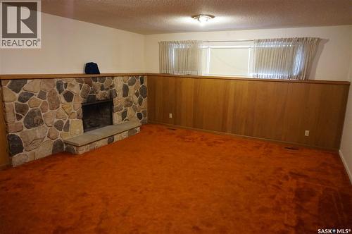 45 Tibbits Road, Regina, SK - Indoor Photo Showing Other Room With Fireplace