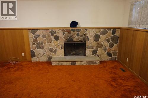 45 Tibbits Road, Regina, SK - Indoor Photo Showing Other Room With Fireplace