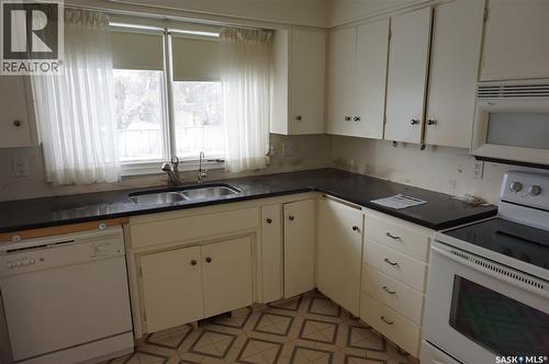 45 Tibbits Road, Regina, SK - Indoor Photo Showing Kitchen With Double Sink