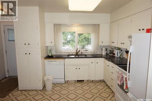 45 Tibbits Road, Regina, SK - Indoor Photo Showing Kitchen With Double Sink