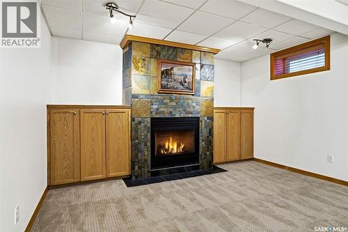 2906 St James Crescent, Regina, SK - Indoor Photo Showing Other Room With Fireplace