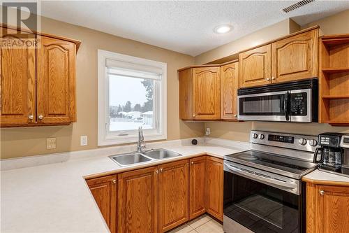 76 Hesta Street, Dowling, ON - Indoor Photo Showing Kitchen With Double Sink