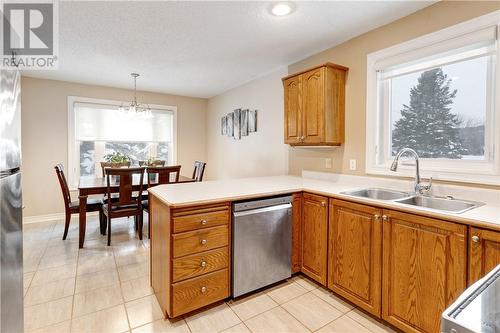 76 Hesta Street, Dowling, ON - Indoor Photo Showing Kitchen With Double Sink