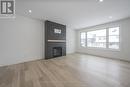 1898 Fountain Grass Drive, London South (South B), ON  - Indoor Photo Showing Living Room With Fireplace 