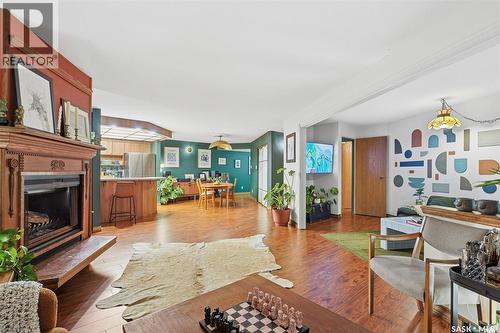101 222 Saskatchewan Crescent E, Saskatoon, SK - Indoor Photo Showing Living Room With Fireplace