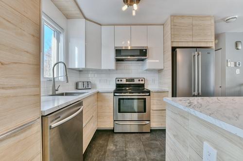 Kitchen - 1173 Rue John-Tapp, Blainville, QC - Indoor Photo Showing Kitchen With Upgraded Kitchen