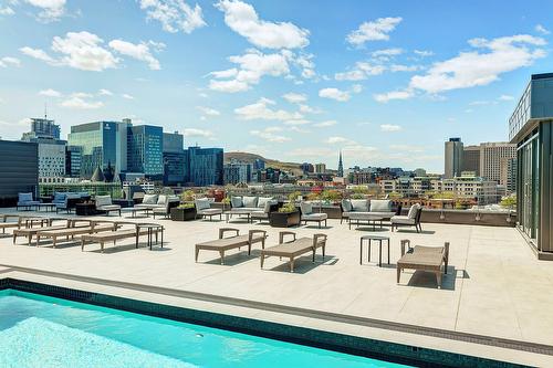 Pool - 214-360 Rue Atateken, Montréal (Ville-Marie), QC - Outdoor With In Ground Pool With View