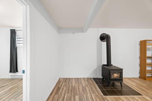 Family room - 8500 Ch. Ladouceur, Sainte-Agathe-Des-Monts, QC - Indoor Photo Showing Other Room With Fireplace