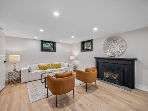 137 Cheltenham Avenue, Toronto, ON - Indoor Photo Showing Basement With Fireplace