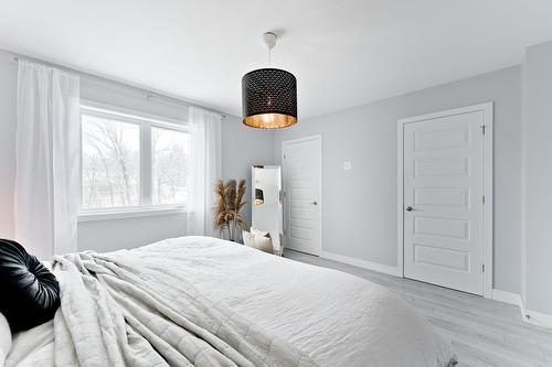 Primary bedroom - 70 Rue Raymond-Auger, Sherbrooke (Brompton/Rock Forest/Saint-Élie/Deauville), QC - Indoor Photo Showing Bedroom