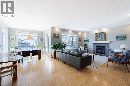 98 Tuscany Estates Crescent Nw, Calgary, AB - Indoor Photo Showing Living Room With Fireplace