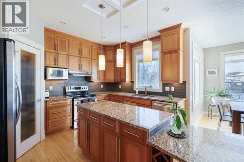 98 Tuscany Estates Crescent Nw, Calgary, AB - Indoor Photo Showing Kitchen With Stainless Steel Kitchen With Upgraded Kitchen