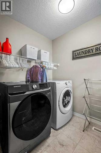 206 Mahogany Passage Se, Calgary, AB - Indoor Photo Showing Laundry Room