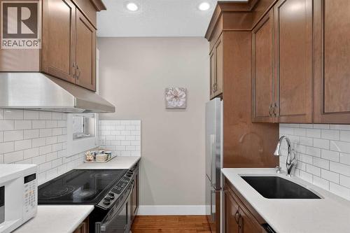 Butler/Spice Kitchen - 72 Rockcliff Grove Nw, Calgary, AB - Indoor Photo Showing Kitchen